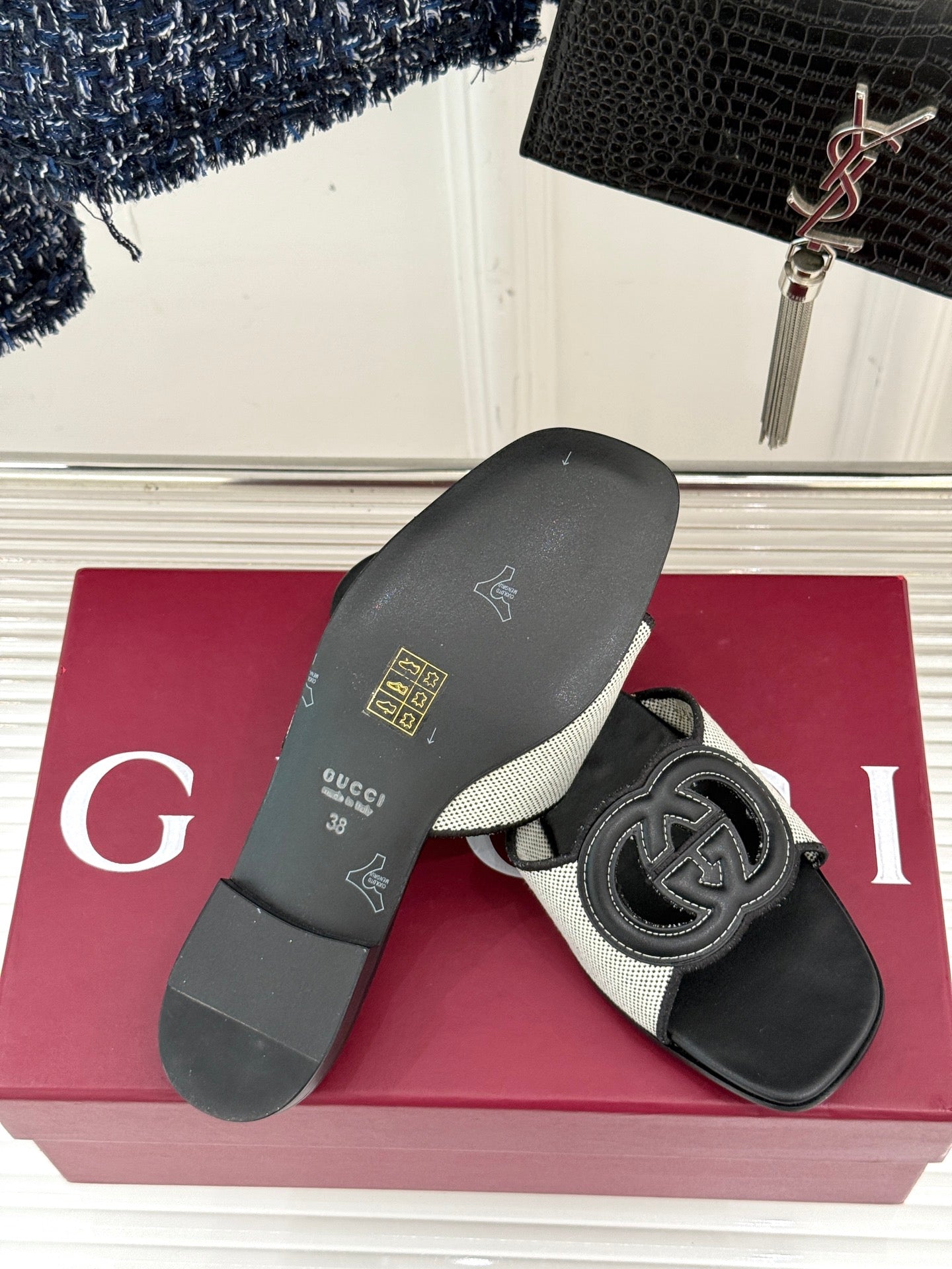 SLIDE SANDALS IN BLACK AND WHITE CALFSKIN