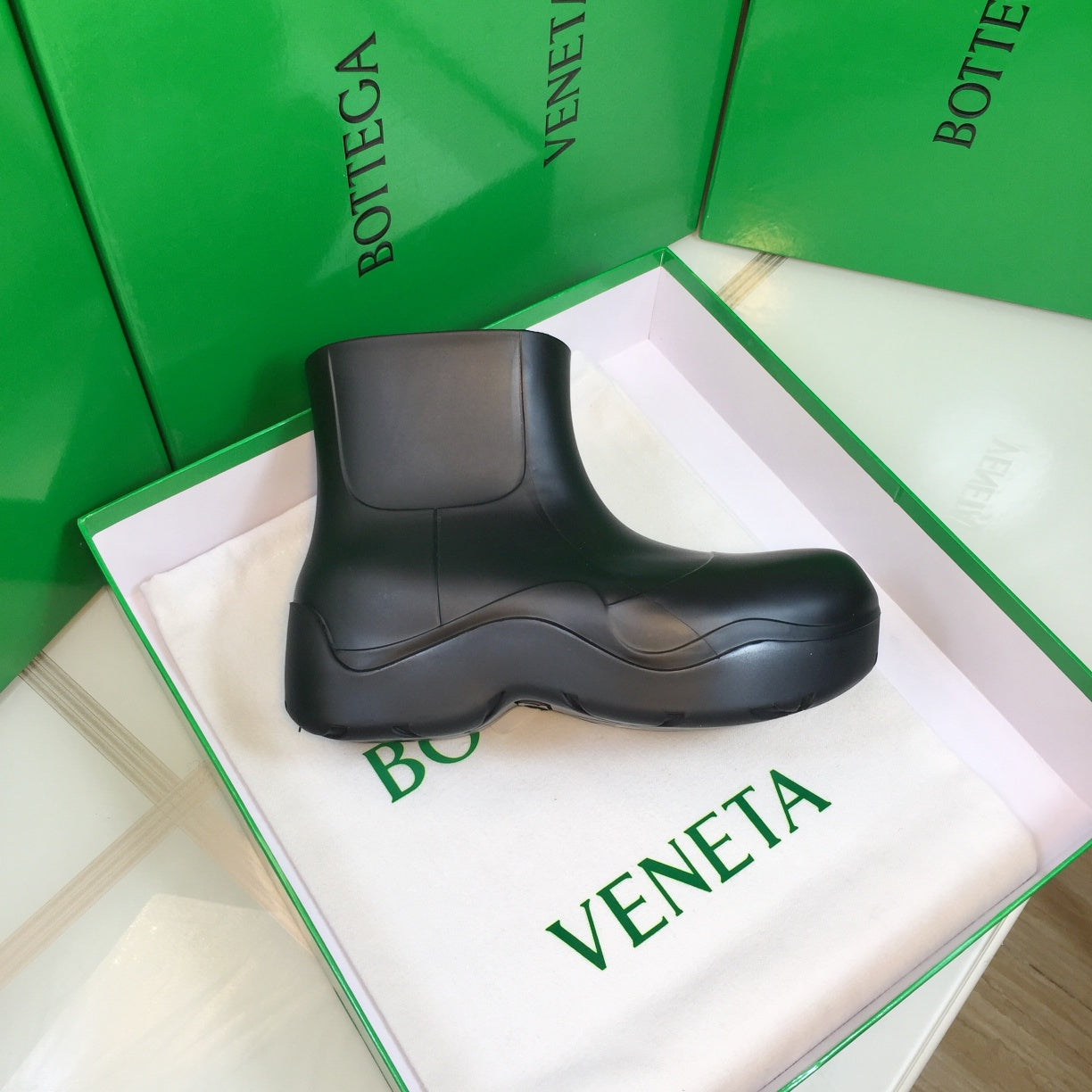 PUDDLE ANKLE BOOT IN BLACK RUBBER