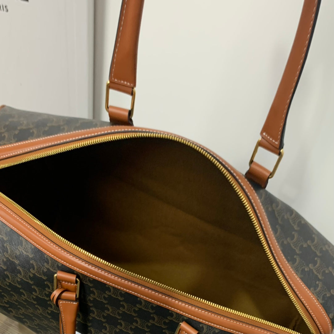 TRAVEL BAG 50 IN BLACK TRIOMPHE CANVAS WITH CELINE PRINT