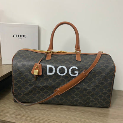 TRAVEL BAG 50 IN BLACK TRIOMPHE CANVAS WITH DOG PRINT