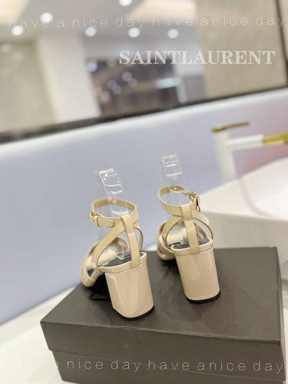 SL TRIBUTE SANDAL GLOSSY PASTEL YELLOW CALFSKIN