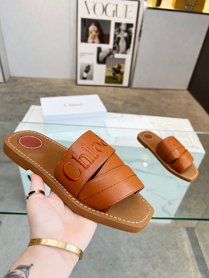 WOODY MULE IN BRONZE BROWM LAMBSKIN WITH EMBROIDERED LOGO