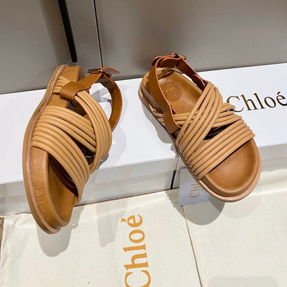 CROSS STRAP SANDAL IN BRONZE BROWN RUBBER WITH GOLD HARDWARE