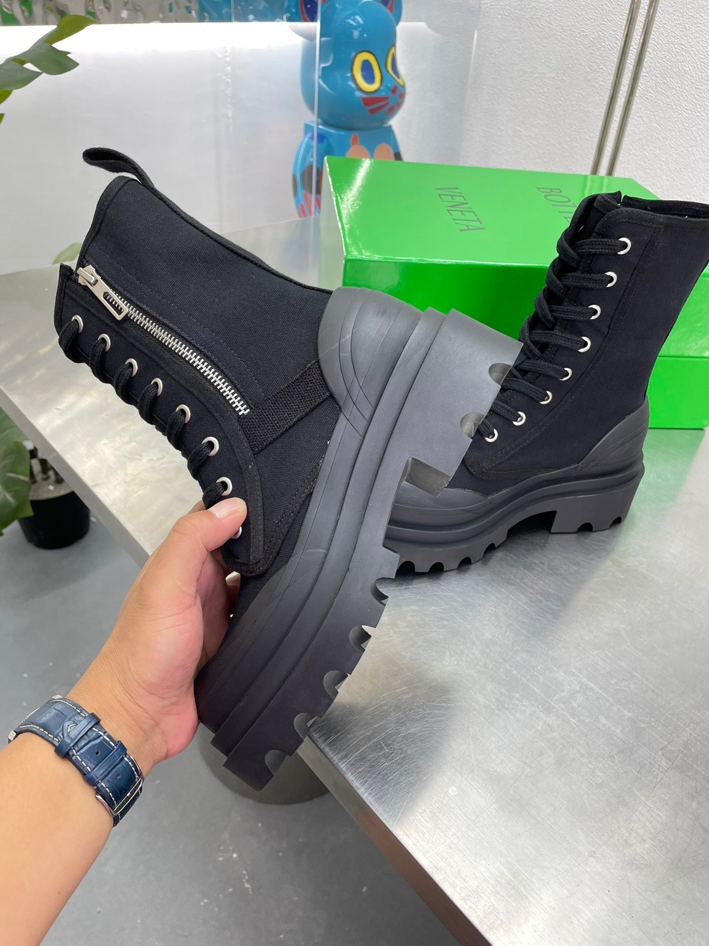 RIBBON BOMBER LACE-UP BOOTS IN BLACK CANVAS