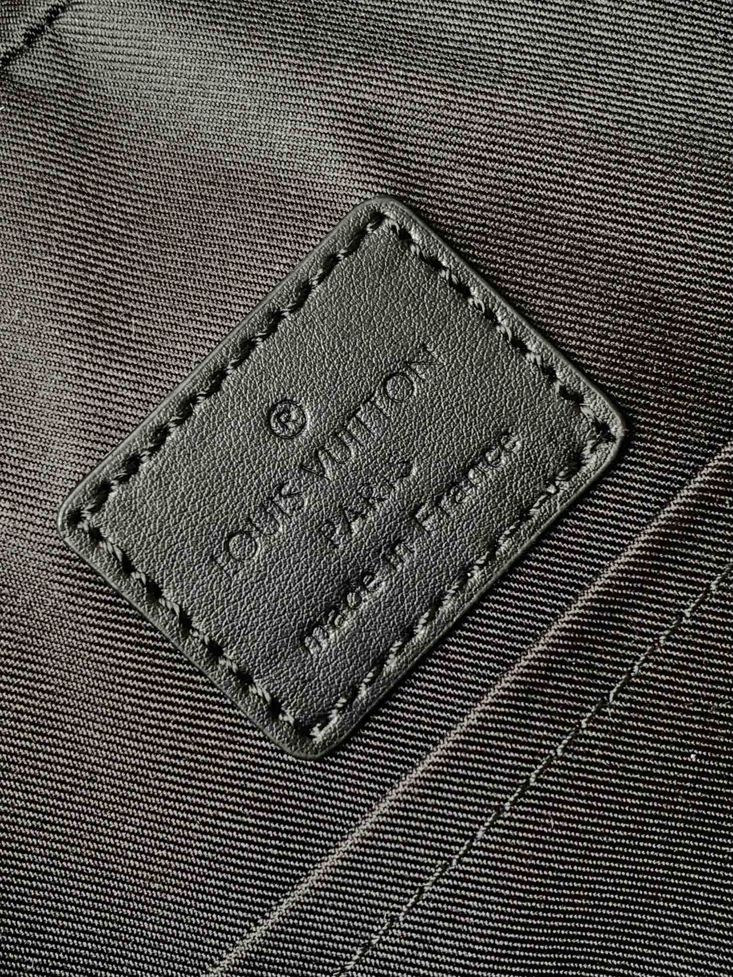 DISCOVERY BACKPACK 41 IN BLACK MONOGRAM MACASSAR CANVAS AND CALFSKIN