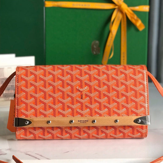 MONTE-CARLO PM CLUTCH 25 IN ORANGE GOYARDINE CANVAS