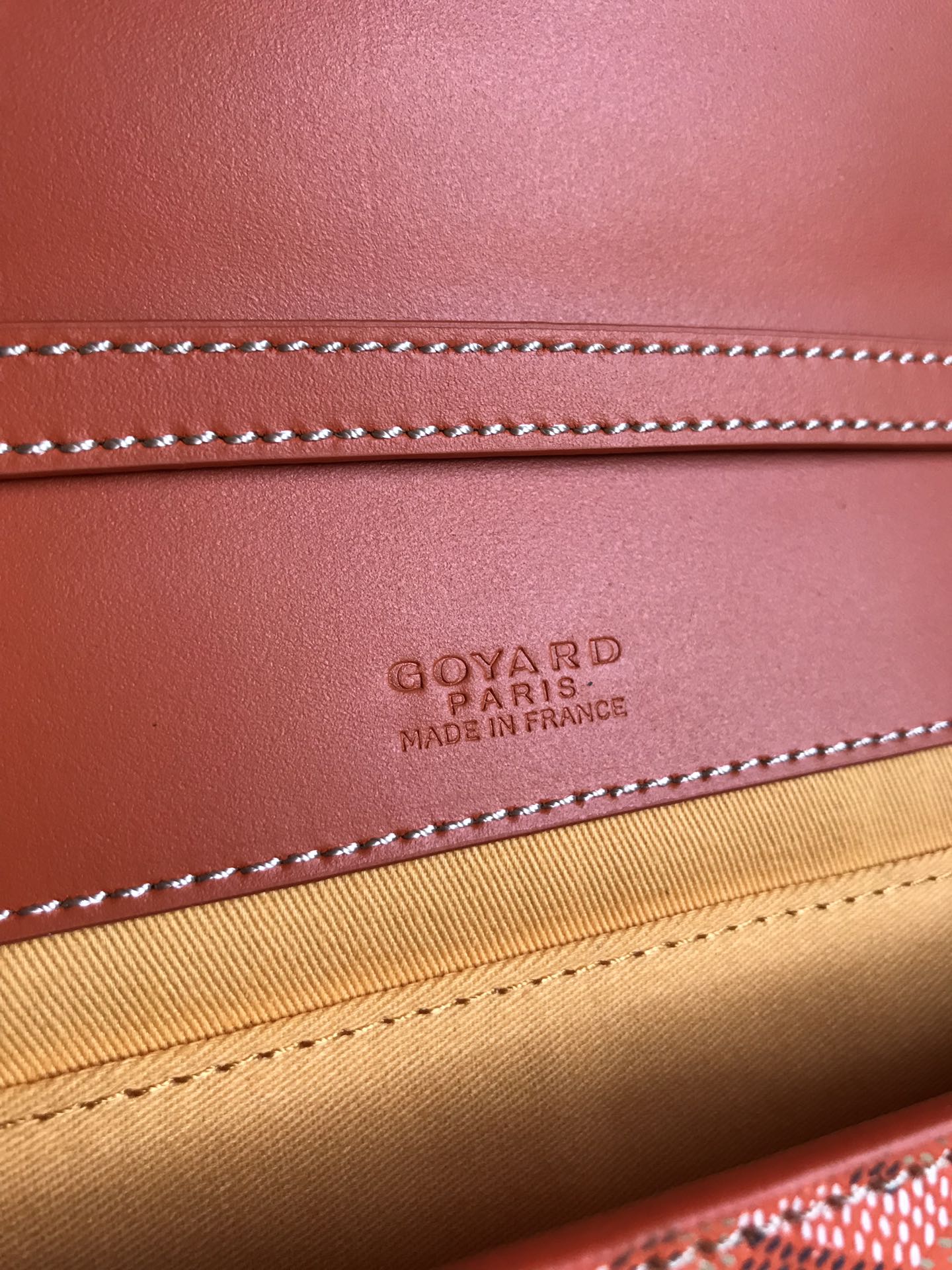 MONTE-CARLO PM CLUTCH 25 IN ORANGE GOYARDINE CANVAS