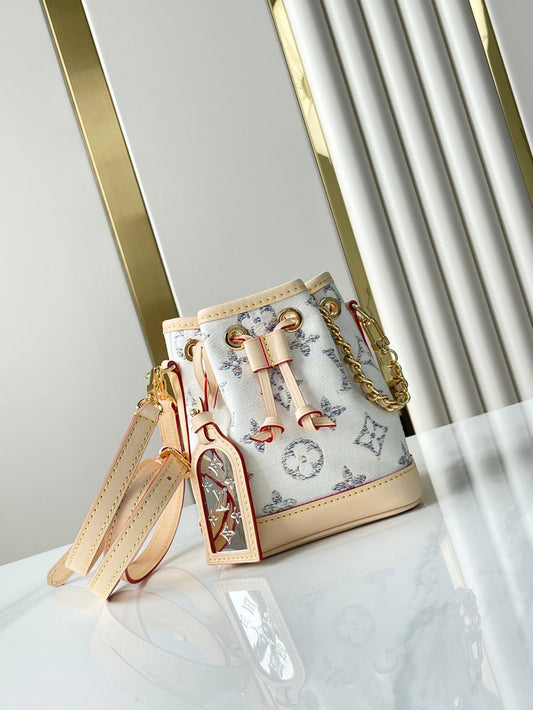 NANO NOÉ 16 IN WHITE MONOGRAM JACQUARD FABRIC AND BEIGE CALFSKIN TRIM