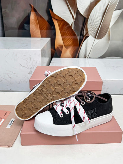 WASHED-DENIM SNEAKERS IN BLACK CANVAS WITH BROWN AND STRIPED LACES