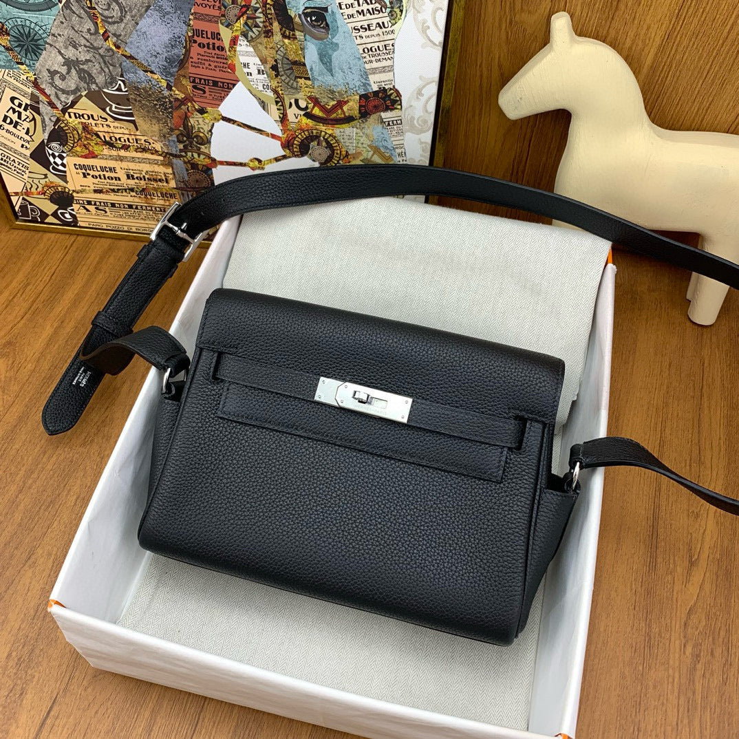 HERM KELLY MESSENGER 25