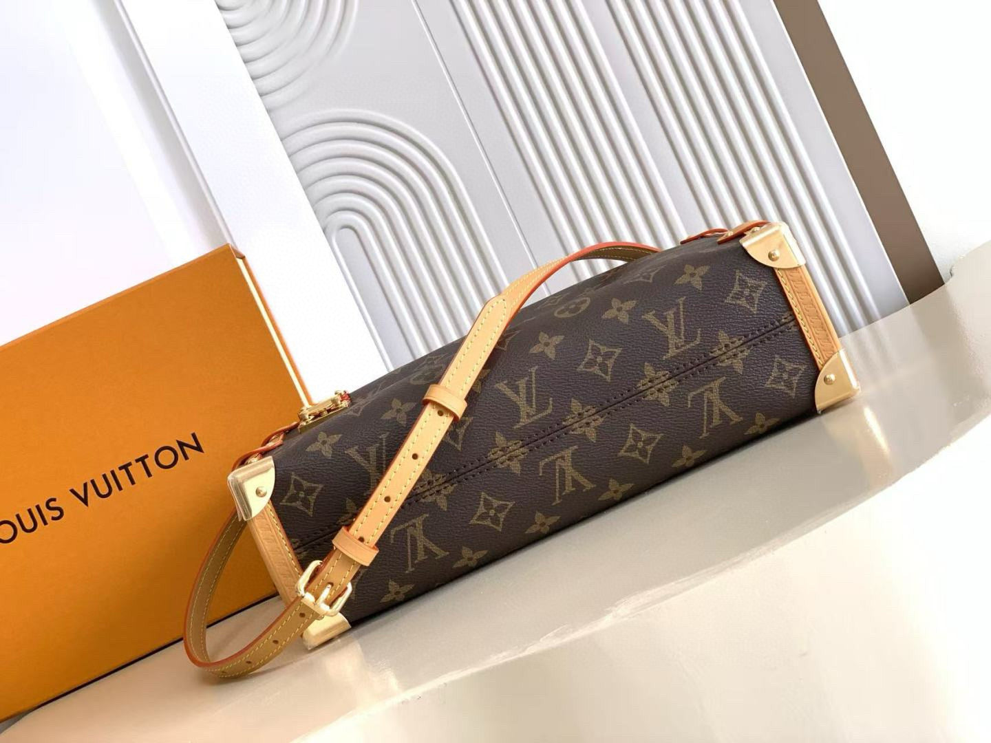 SIDE TRUNK GM 30 CM IN BROWN MONOGRAM CALFSKIN