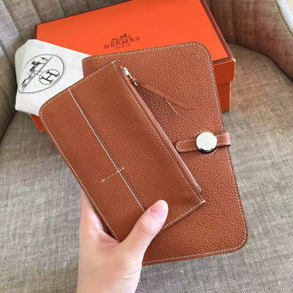 HERM Dogon Duo Wallet In Gold Clemence Leather