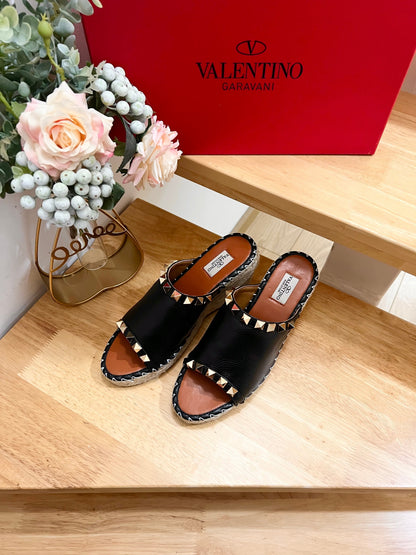 LACE-UP WEDGE SANDALS IN BLACK CALFSKIN WITH STUDS