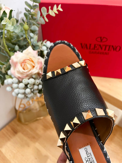LACE-UP WEDGE SANDALS IN BLACK CALFSKIN WITH STUDS