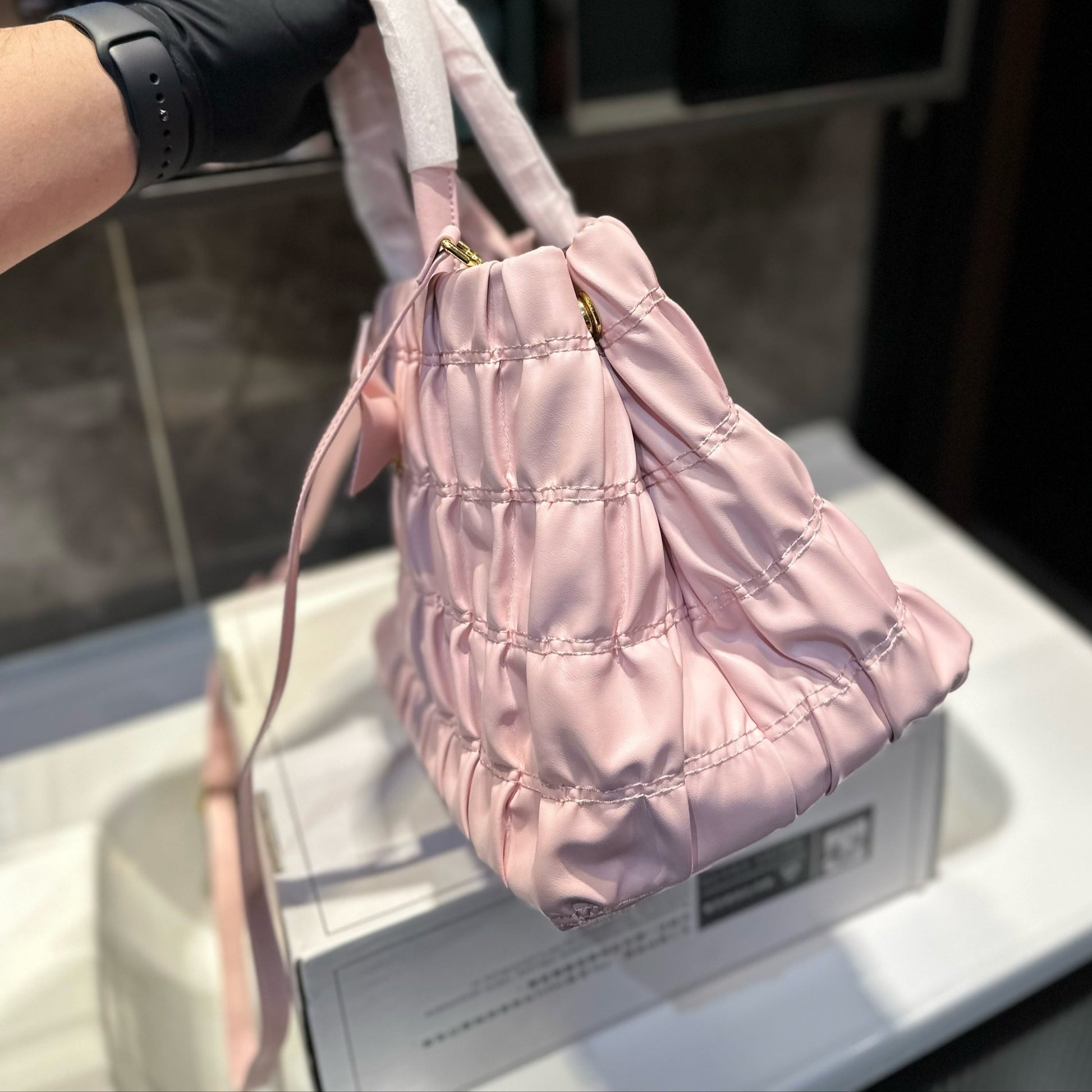 BOW DETAIL RUCHED TOP HANDLE BAG 29 IN LIGHT PINK SAFFIANO LEATHER