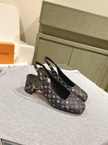 SWING SLINGBACK PUMP 55 MM IN BLACK MONOGRAM CALFSKIN