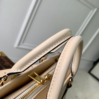 ONTHEGO EAST WEST BAG 25 IN BEIGE MONOGRAM EMBOSSED COWHIDE