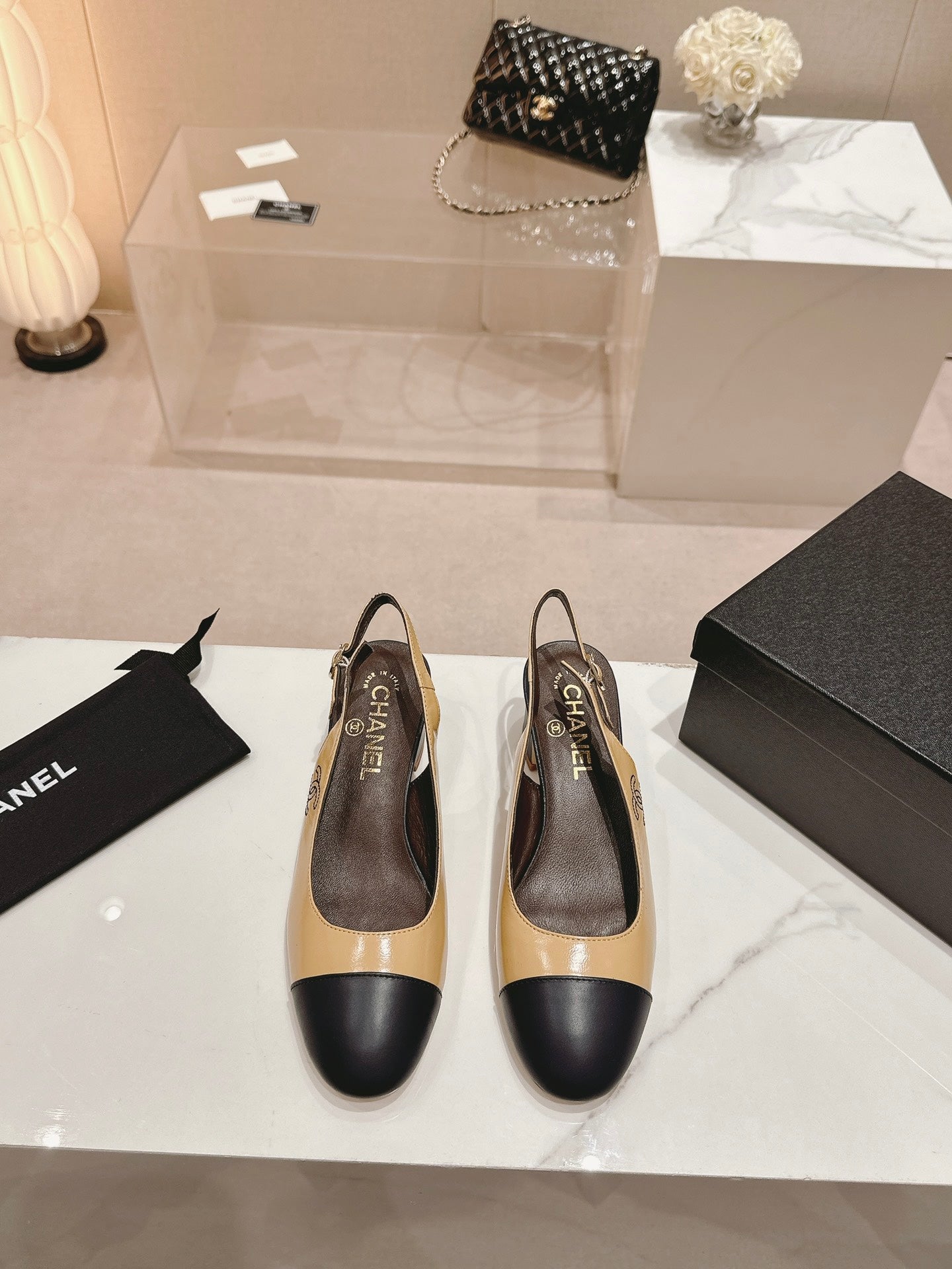 SLINGBACKS PEANUT BROWN MIX BLACK SHEEPSKIN