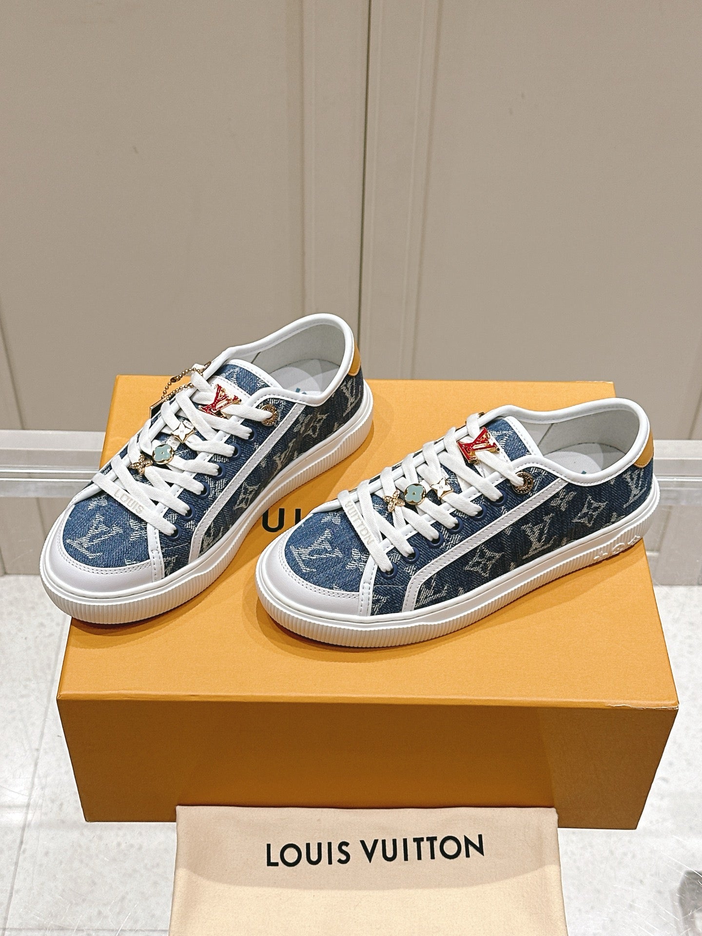 LV LAGOON SNEAKER IN DENIM BLUE MONOGRAM WITH BUCKLE