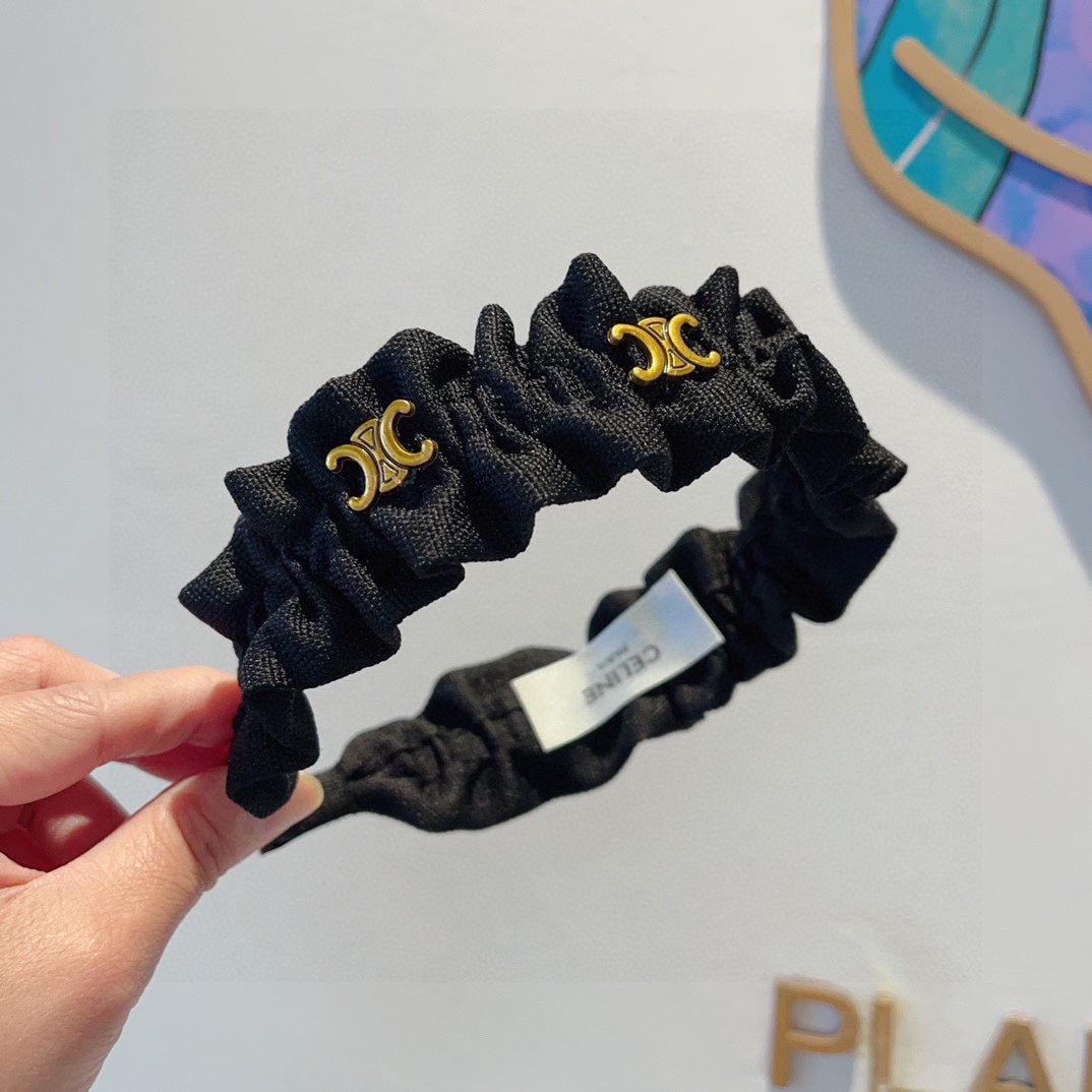 BLACK FABRIC WITH GOLD LOGO HAIRBAND 415931