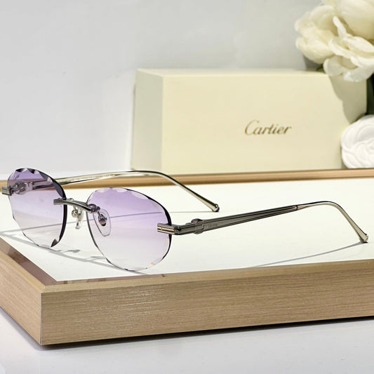 C DE RIMLESS ROUND FRAME SUNGLASSES CT0611S IN METAL