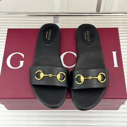SLIDE SANDALS IN BLACK CALFSKIN WITH GOLD HARDWARE