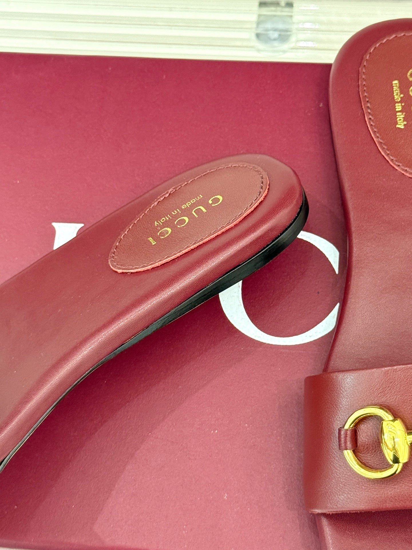 SLIDE SANDALS IN RED CALFSKIN WITH GOLD HARDWARE
