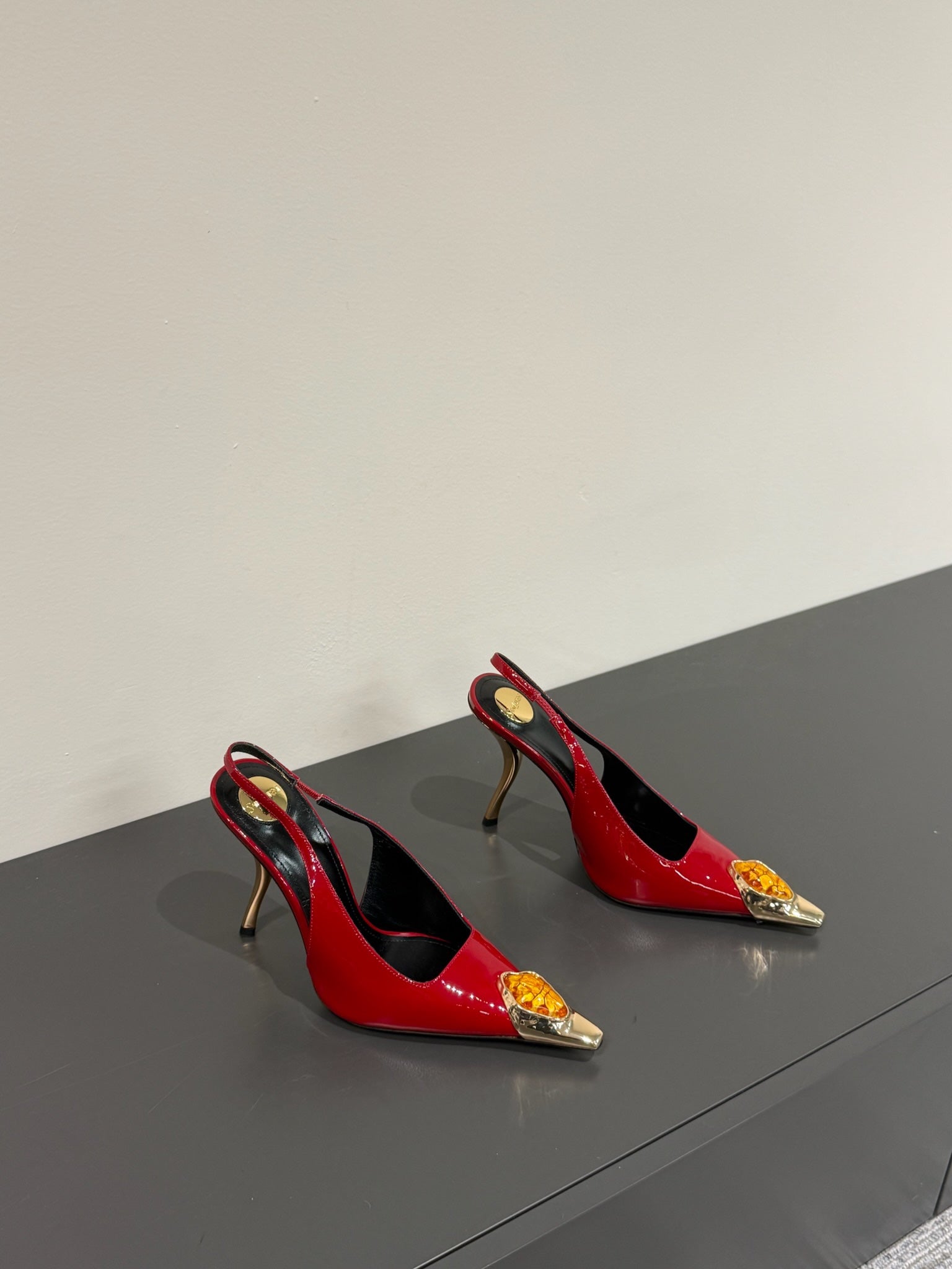 ORANGE GEM-STUDDED SLINGBACK PUMPS IN RED PATENT CALFSKIN