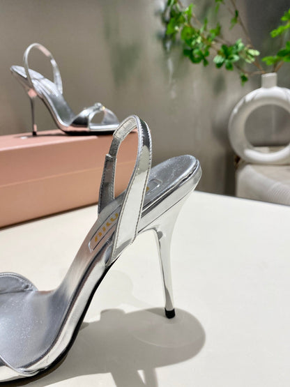 TWO STRAP HIGH HEELED SANDALS IN SILVER METALLIC GLOSSY SHEEPSKIN