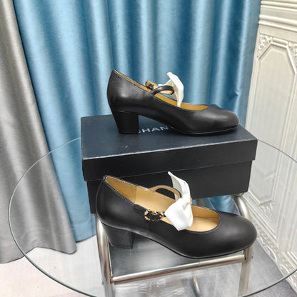 HIGH MARY JANE SHOES BLACK SHEEPSKIN WITH WHITE BOW