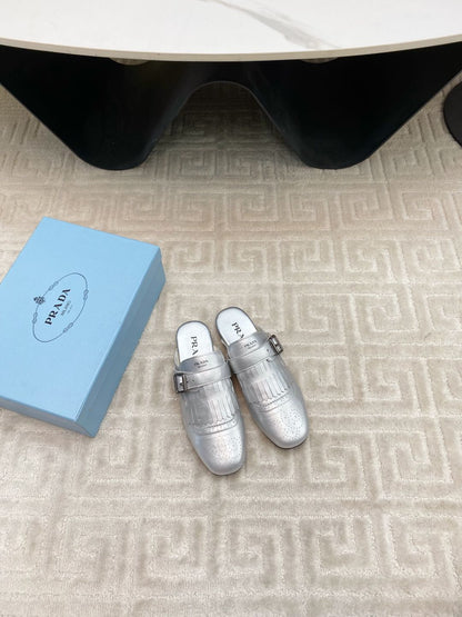 TASSEL MULES IN SILVER METALLIC LAMBSKIN