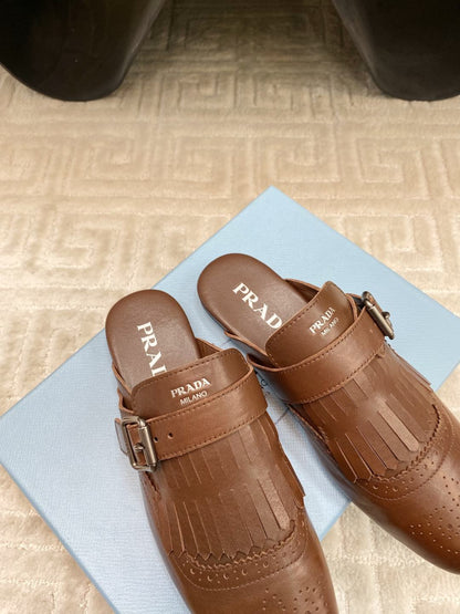 TASSEL MULES IN RUSSET BROWN LAMBSKIN