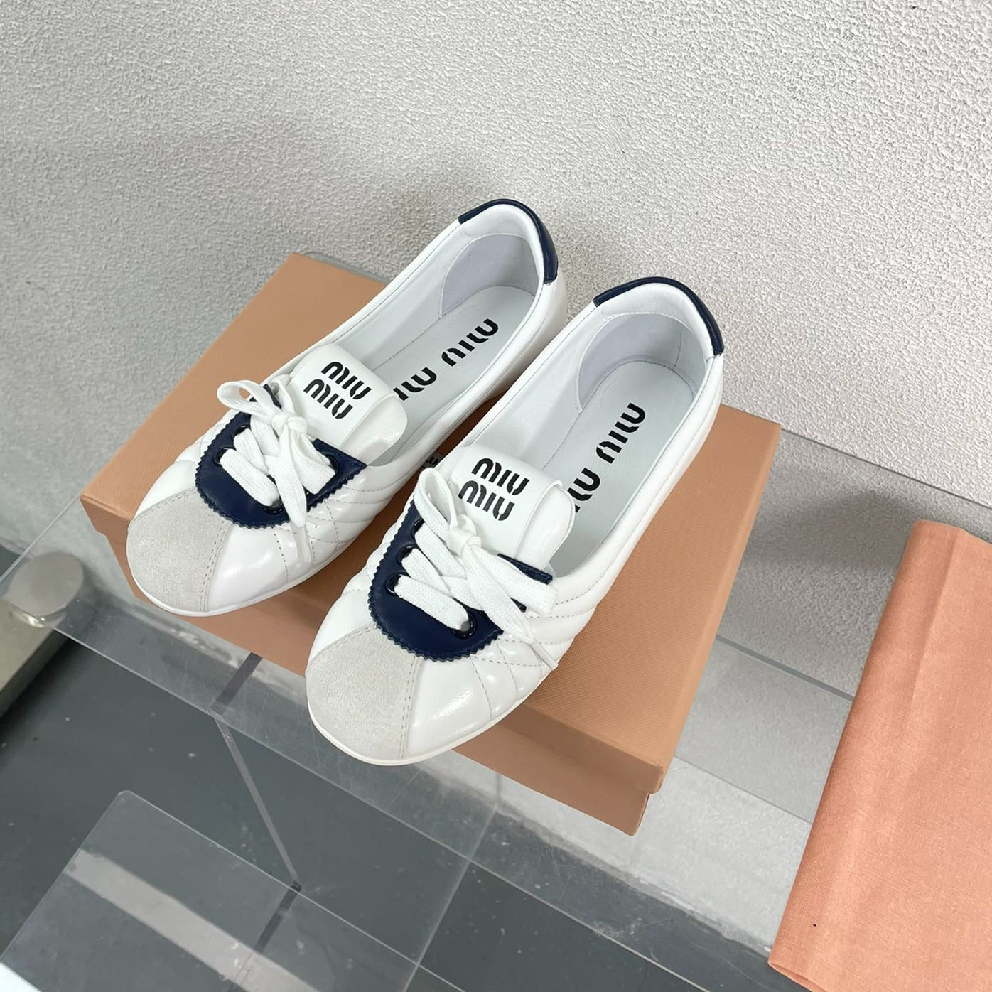 White Leather Ballet Flats With Black