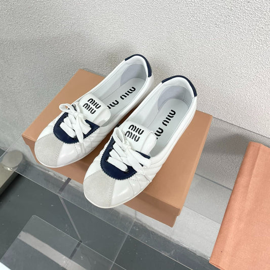 White Leather Ballet Flats With Black