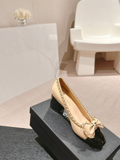 BOWKNOT HIGH HEELS IN BEIGE CREAM MIX BLACK SHEEPSKIN