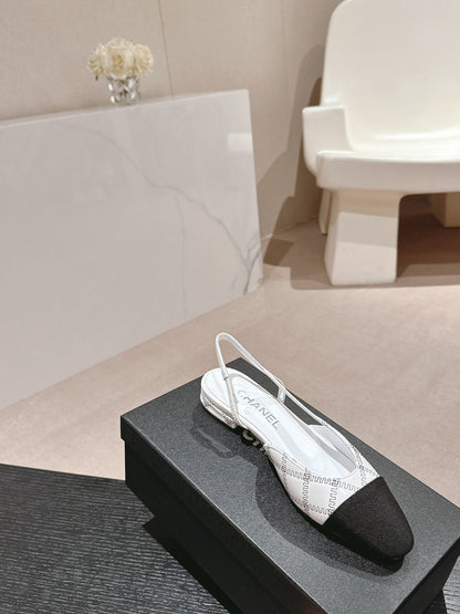 SLINGBACKS IN WHITE LAMBSKIN AND BLACK SATIN