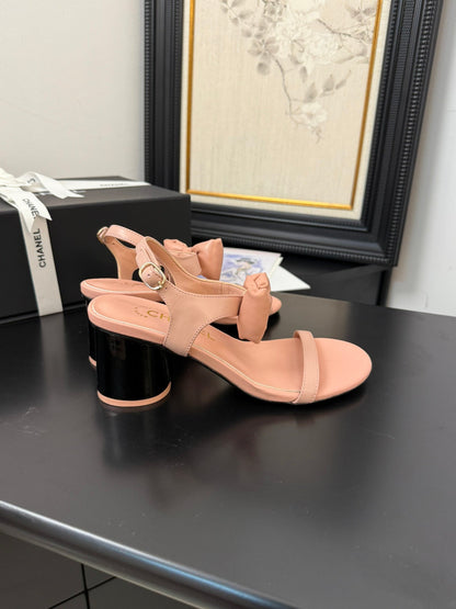 MID HEEL SANDALS IN PEACHY PINK CALFSKIN WITH BOW