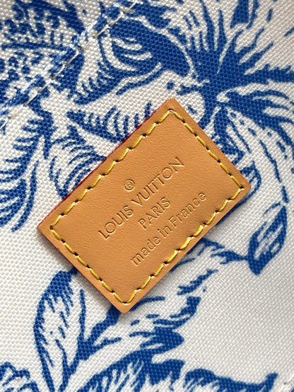FÉLICIE POCHETTE 21 IN LAGOON BLUE MONOGRAM TILES CANVAS