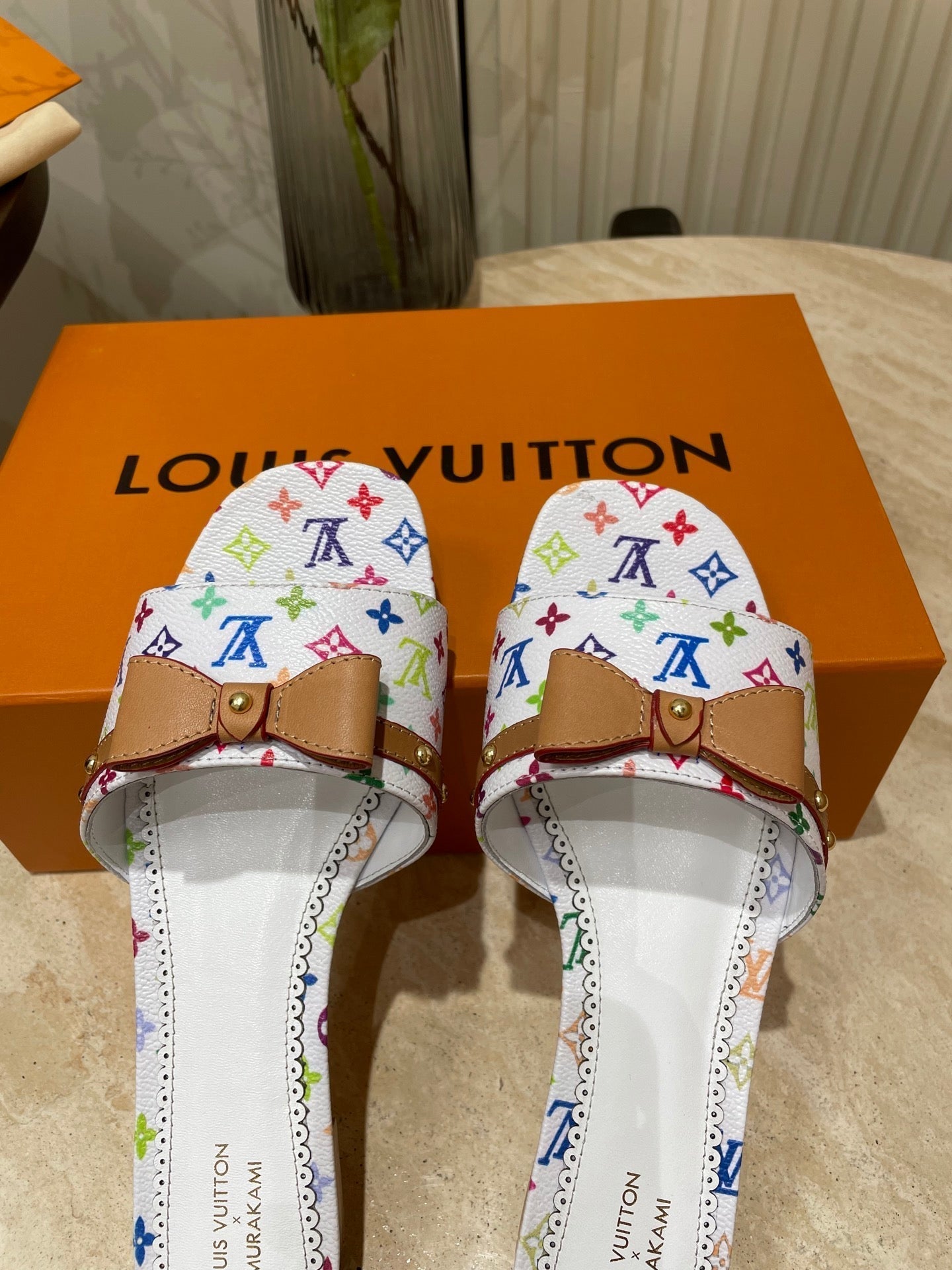 FLAT MULES IN WHITE MONOGRAM LAMBSKIN