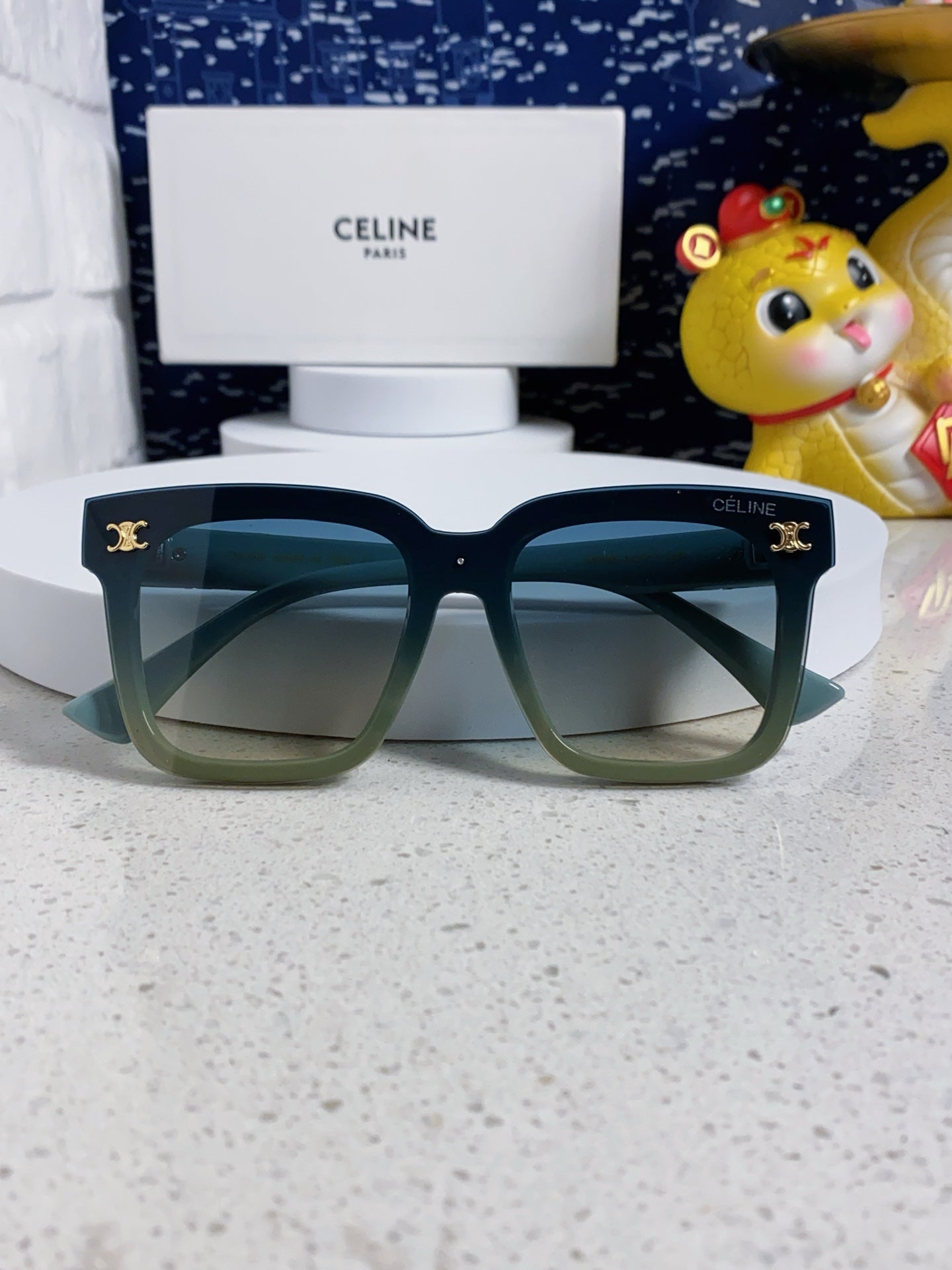 TRIOMPHE SUNGLASSES 548632 IN BABY BLUE ACETATE