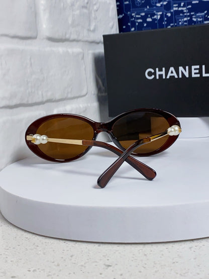OVAL SUNGLASSES 640342 IN BROWN CLEAR ACETATE METAL FRAME