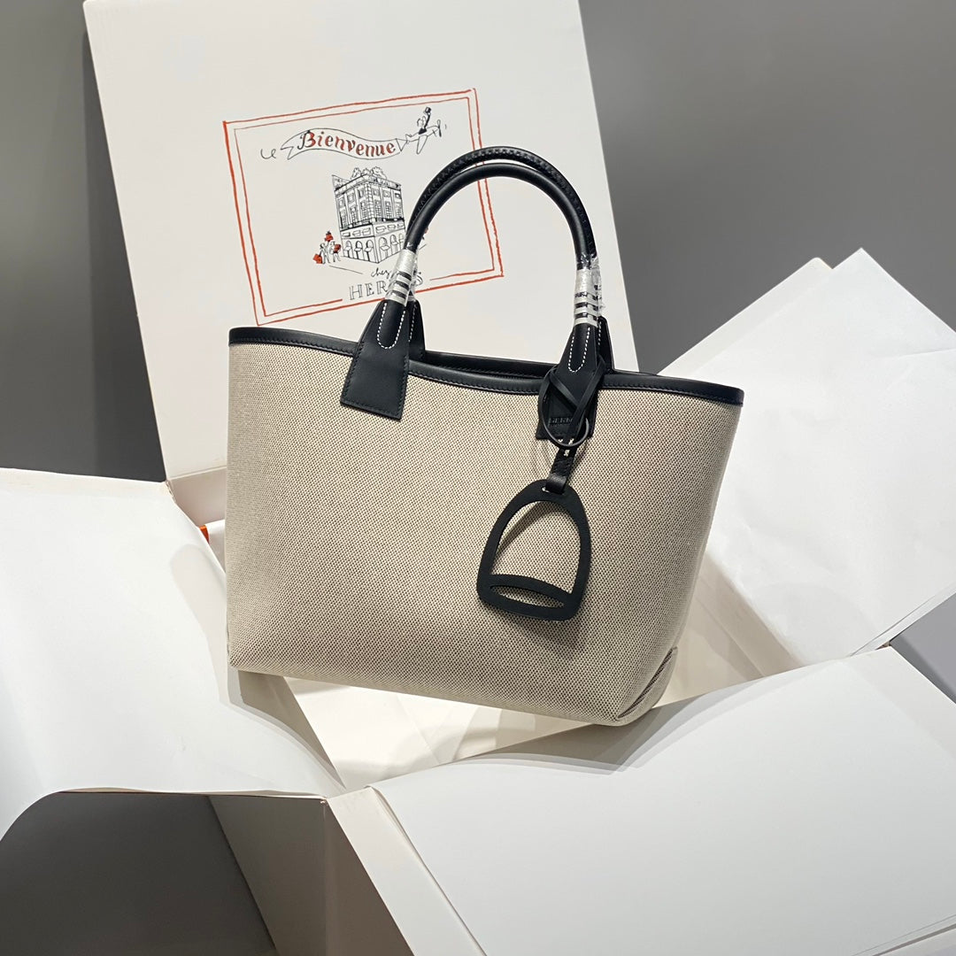 STEEPLE 28 BAG IN OFF-WHITE H CANVAS AND BLACK SWIFT CALFSKIN