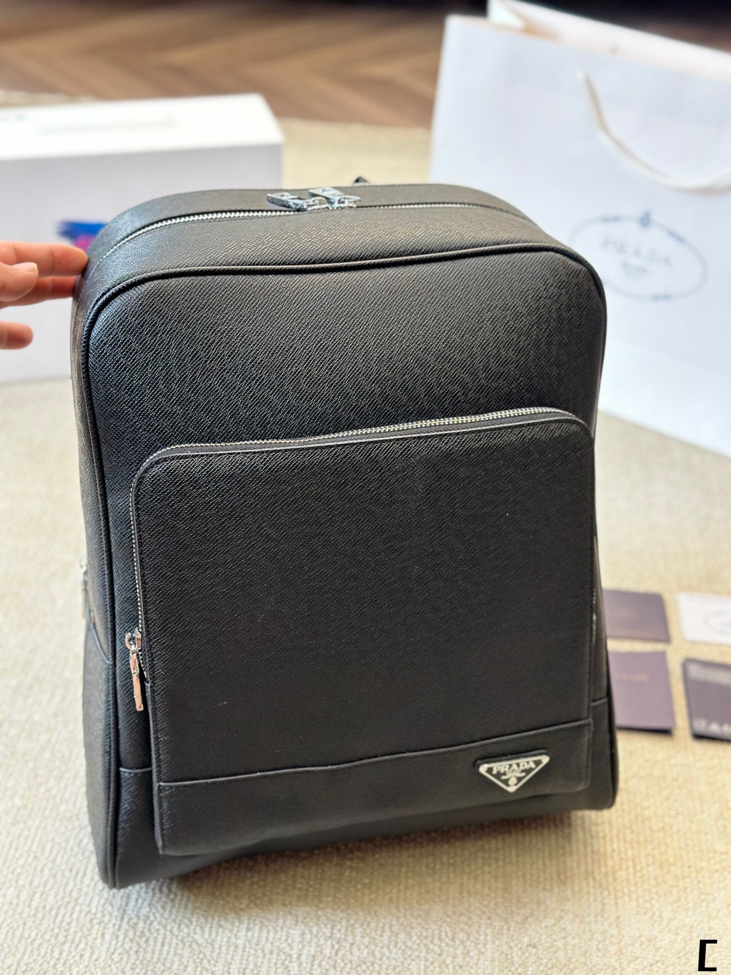 FRONT ZIP POCKET BACKPACK 38 IN BLACK GRAINED CALFSKIN