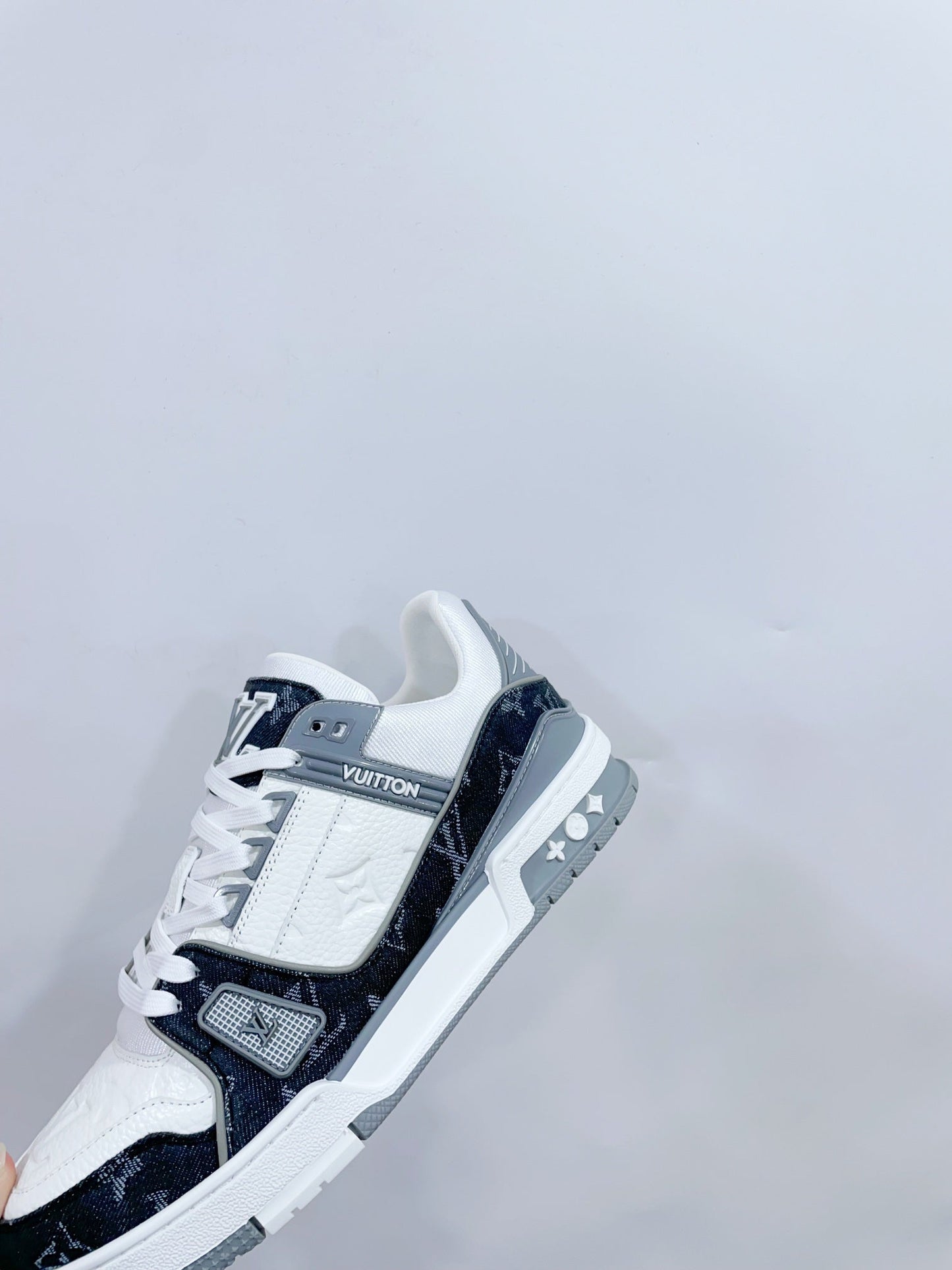 LV TRAINER SNEAKER IN WHITE CALFSKIN AND BLACK MONOGRAM DENIM