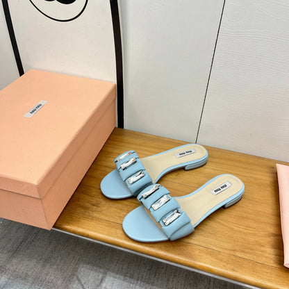 FLAT SLIDE IN LIGHT BLUE CALFSKIN