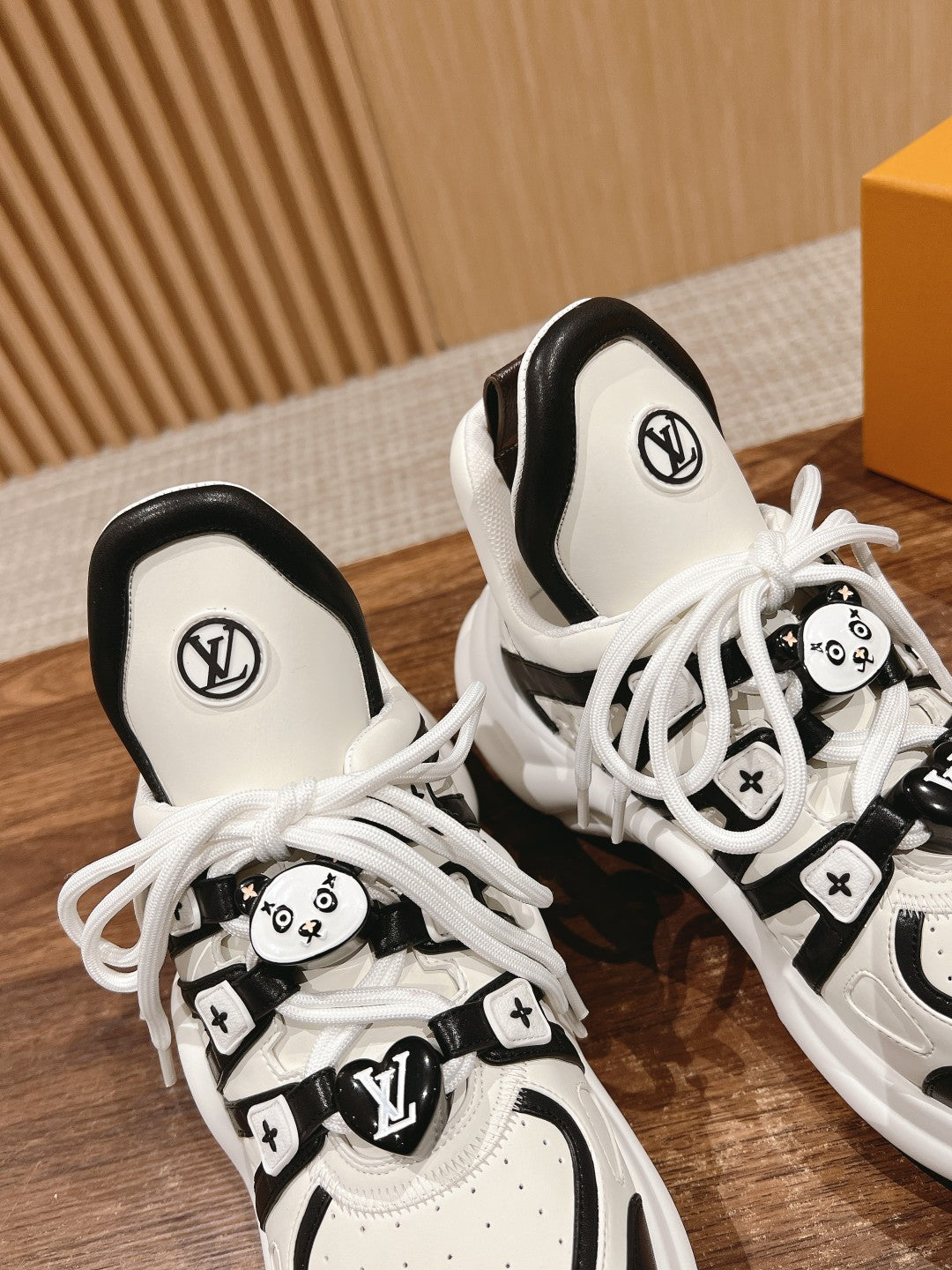 LV ARCHLIGHT SNEAKER IN WHITE MIX BLACK EMBOSSED CALFSKIN 101058