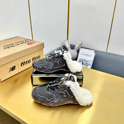 MIUxNB 530 SNEAKER MULES IN BLACK CALFSKIN SHEARLING