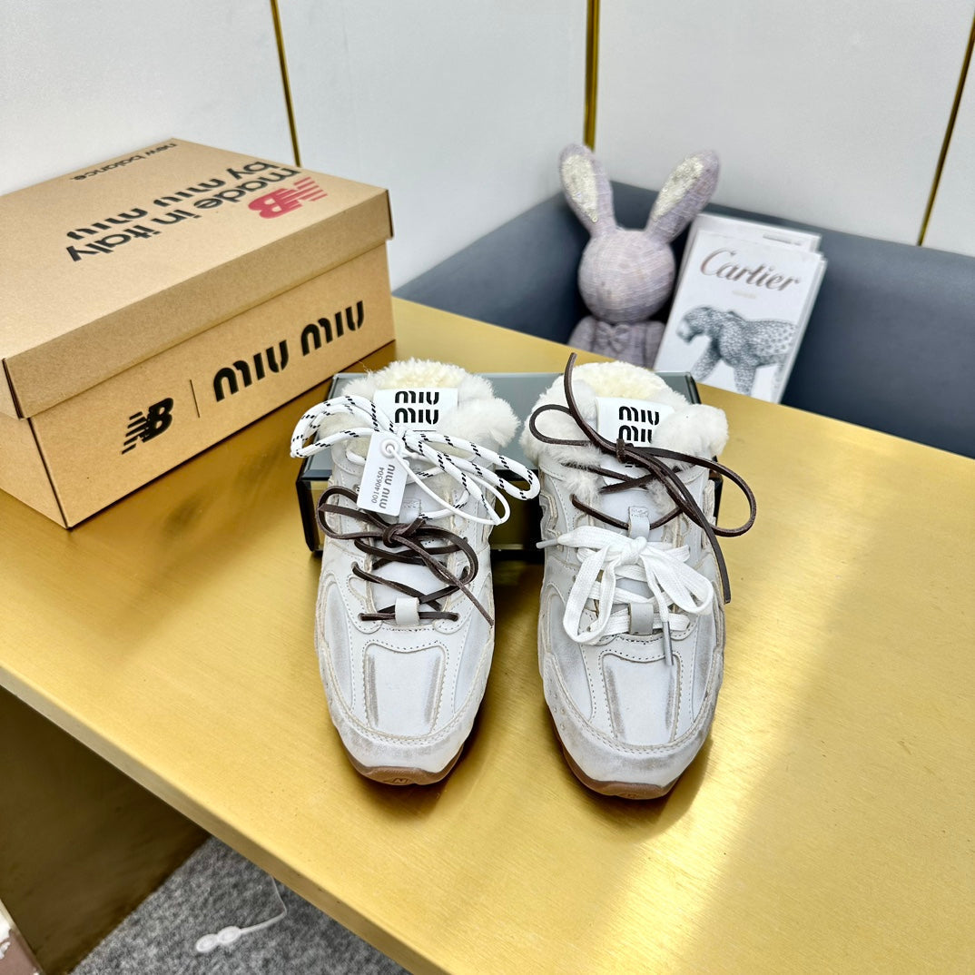 MIUxNB 530 SNEAKER MULES IN DISTRESSED WHITE CALFSKIN SHEARLING