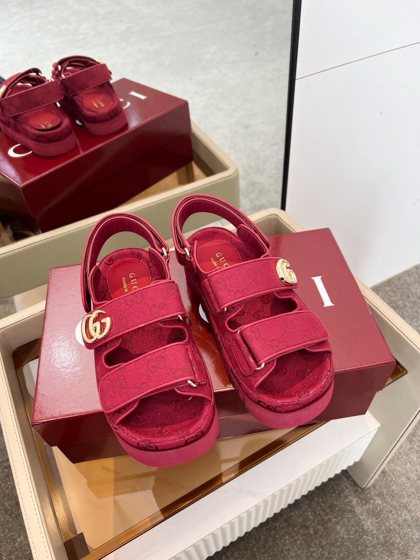VELCRO STRAP SANDALS IN BRICK RED MONOGRAM CANVAS GOLD HARDWARE