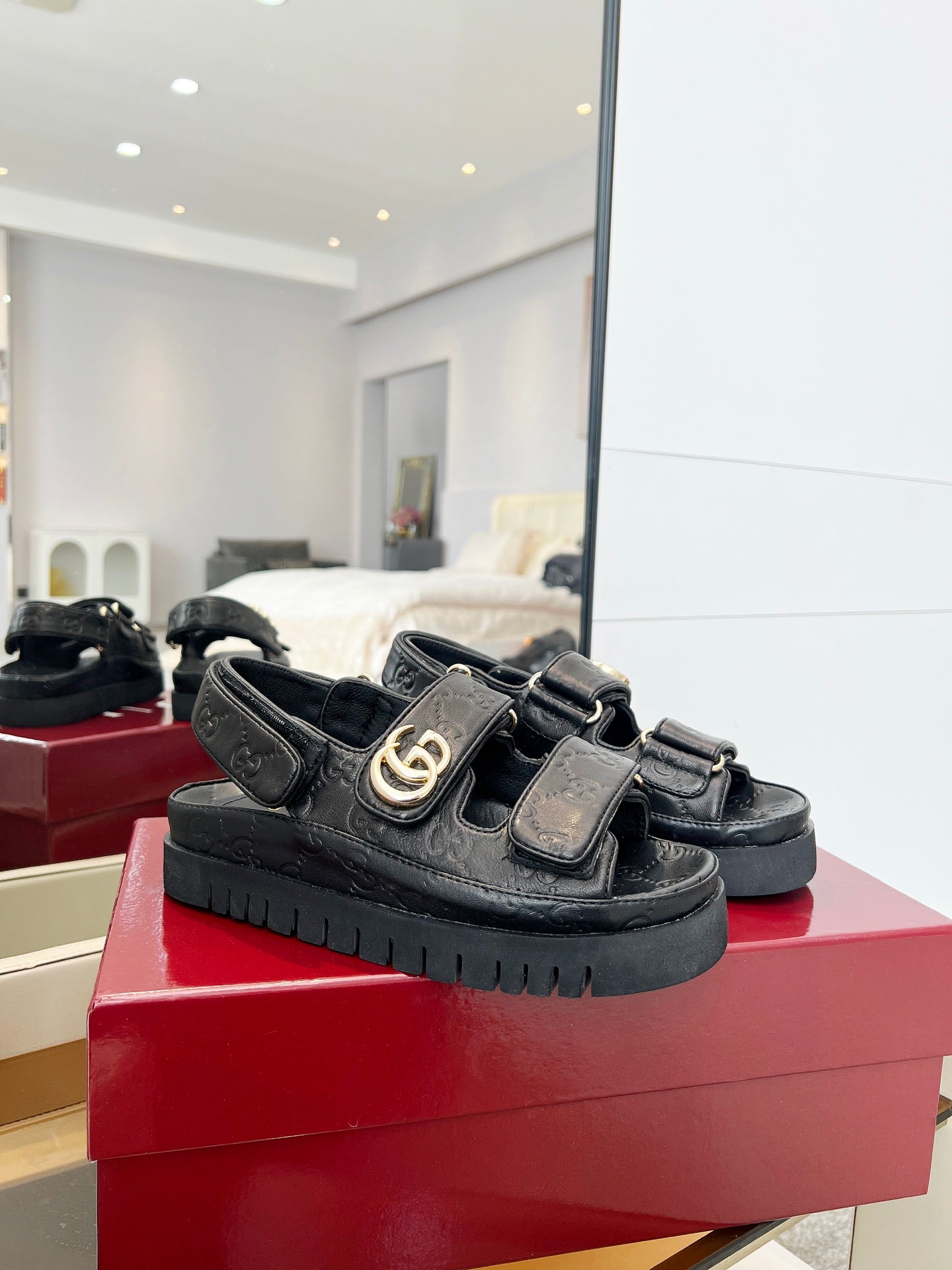 VELCRO STRAP SANDALS IN BLACK EMBOSSED LOGO LAMBSKIN GOLD HARDWARE